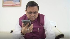 CM-DHAMI-IN-PHONE.jpg